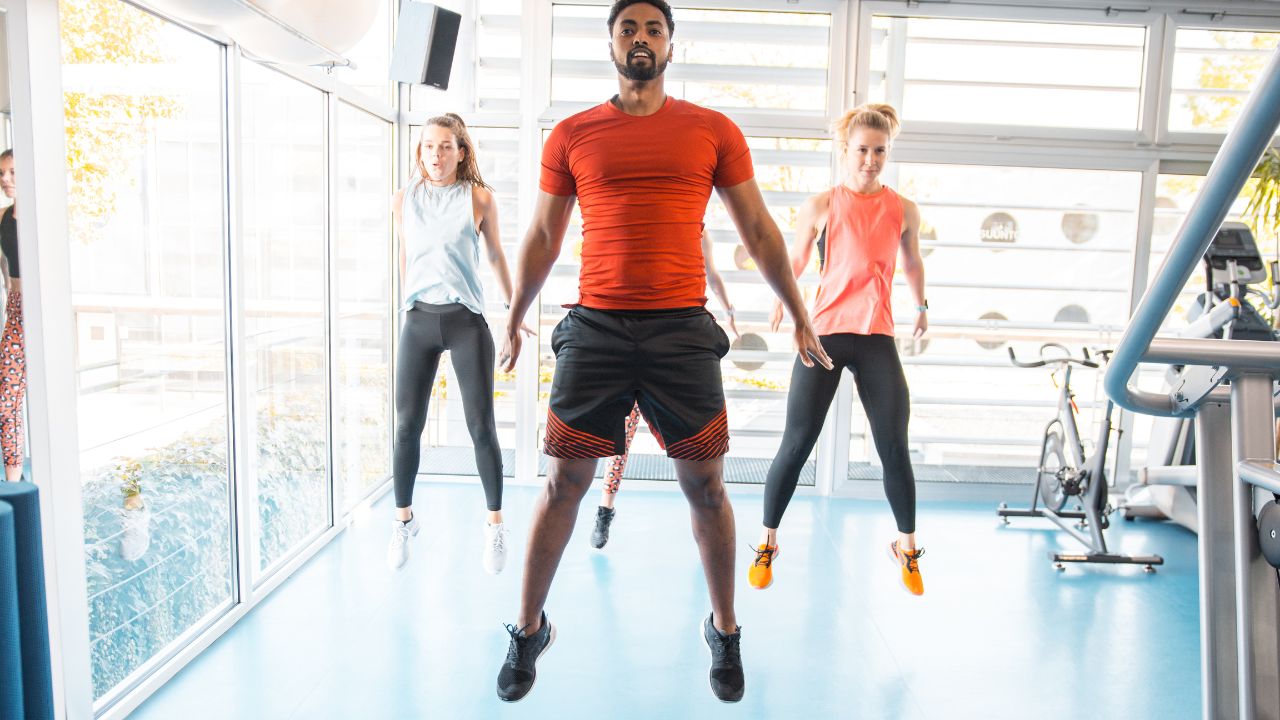 Performing A Burpee Exercise.